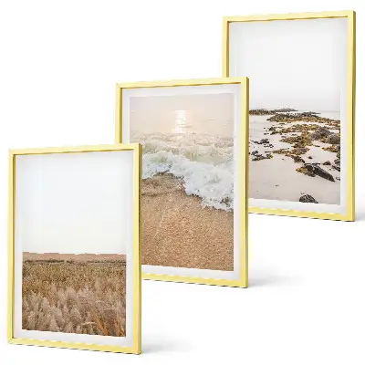 Triptykon med strandbølger og sten med ramme i sommertema
