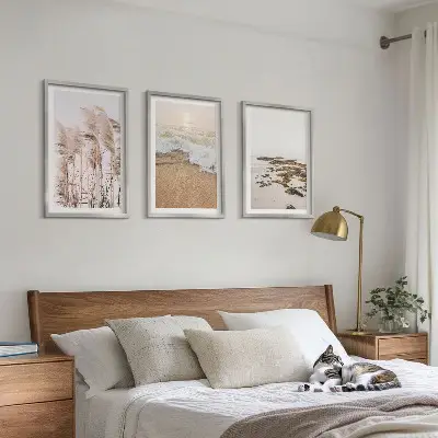 Billedsæt til soveværelset med motiv af strandgræs, bølger og sten i boho-stil