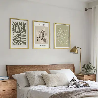 Triptyk med plantemotiver dæmpede farver med ramme
