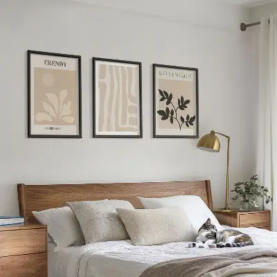 Triptykon med ramme stilfulde plantemønstre i beige og sort