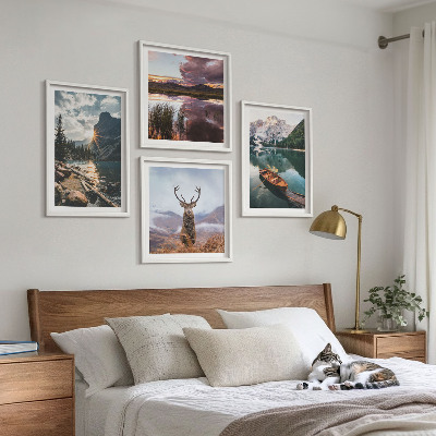 Billedvæg over sofa Bjergsø båd solnedgang hjorte