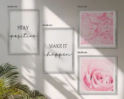 Billedvæg over sofa med minimalistiske lyserøde blomster