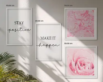 Billedvæg over sofa med minimalistiske lyserøde blomster