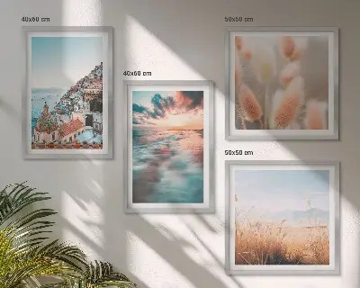 Billedvæg til sofa med havsolnedgang og blomster