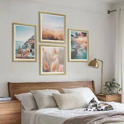 Billedvæg til sofa med havsolnedgang og blomster