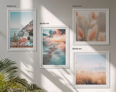 Billedvæg til sofa med havsolnedgang og blomster