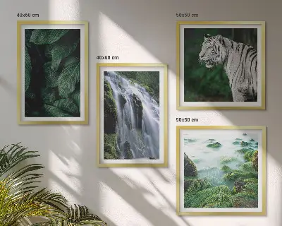 Billedvæg over sofa med motiv af hvid tiger, vandfald og blade