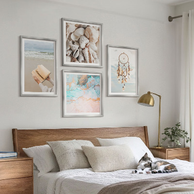 Billedvæg over sofa Muslingeskaller boho bog