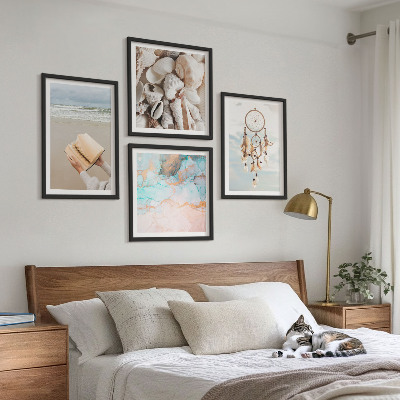 Billedvæg over sofa Muslingeskaller boho bog