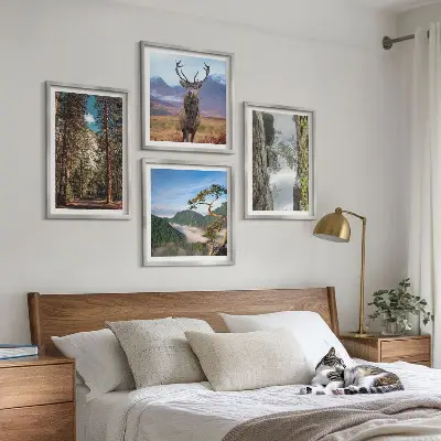 Billedsæt med ramme med motiv af vej, skov, bjerge og hjorte i naturen