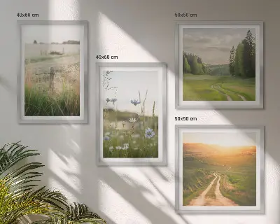 Billedvæg med landskabsmotiv natur med marker og sol over sofa