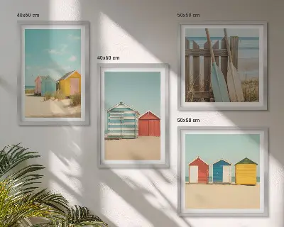 Billedsæt med ramme farverige huse, strand og sol