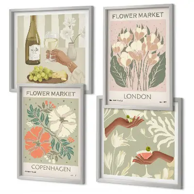 Blomsterplakat med vinby-motiv til væggen over sofaen
