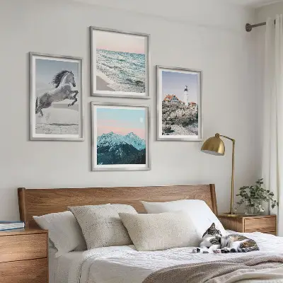 Billedsæt med ramme med motiver af heste, bevægelse, strand, fyrtårn og bjerge