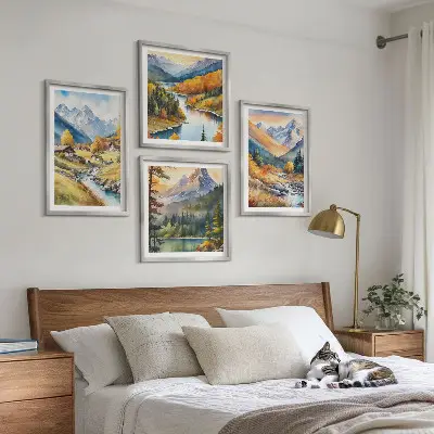 Billedvæg over sofa bjerglandskab med flod og hytter
