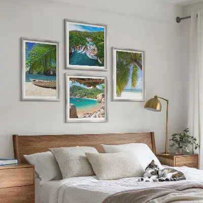 Billedsæt med ramme med motiv af strand, båd, vandfald og palmer
