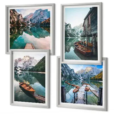 Billedsæt med ramme med motiver af sø, bjerge, både og sommerhus