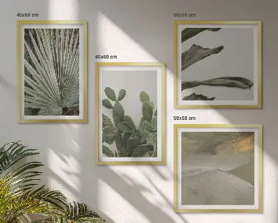 Billedvæg over sofa med blade af tropiske planter i pastel