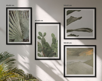 Billedvæg over sofa Blade af tropiske planter i pastel