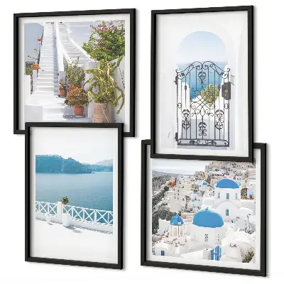 Billedvæg over sofa med motiv af hvide trapper, planter og hav