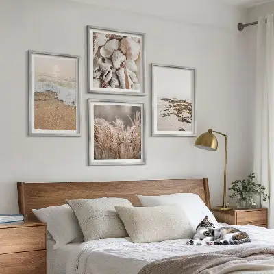Billedsæt med ramme strandgræs med bølger og sten i boho-stil
