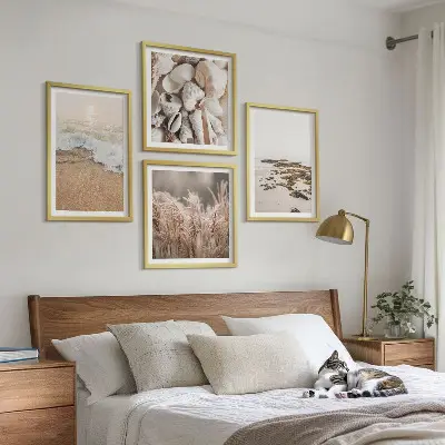 Billedsæt med ramme strandgræs med bølger og sten i boho-stil
