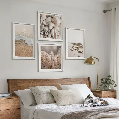 Billedsæt med ramme strandgræs med bølger og sten i boho-stil