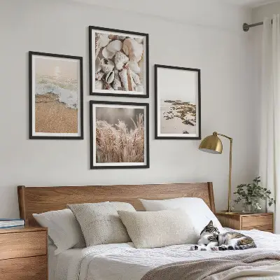 Billedsæt med ramme strandgræs med bølger og sten i boho-stil