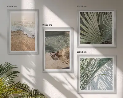 Billedvæg med vand, strandhat og solbriller til ophæng over sofaen