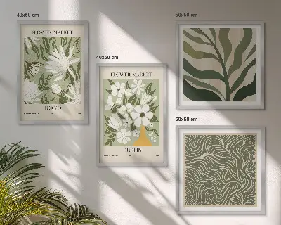 Billedvæg over sofa med boho-inspirerede plantemønstre