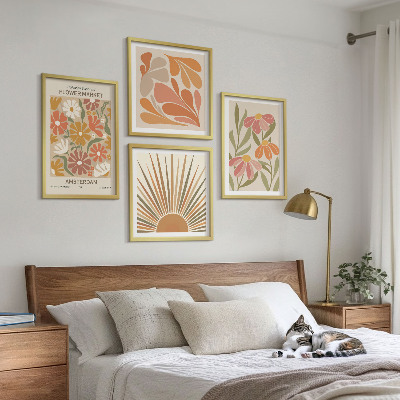 Billedvæg over sofa Pastel solblomster