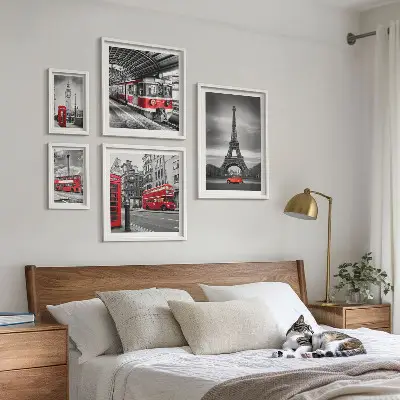 Billedsæt over sofa med motiv af udsigt over London og Paris