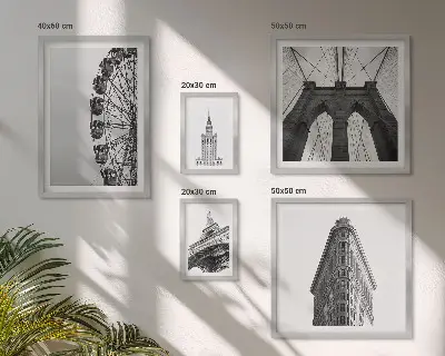 Billedsæt over sofa med motiv af sort og hvid storbyarkitektur
