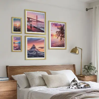 Billedsæt over sofa med havlandskaber og palmer