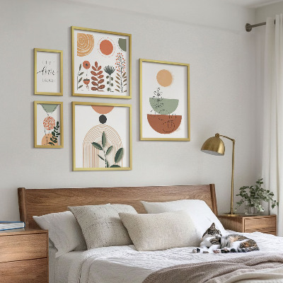 Billedsæt over sofa Stilfuld plante- og geometrisk grafik