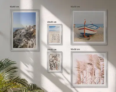 Billedsæt over sofa motiver af landskaber, strande og hvide bygninger