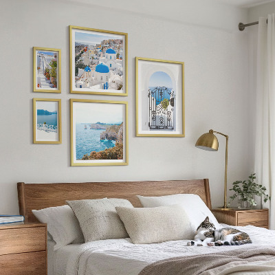 Billedkomposition til væg Santorini huse med blåt hav