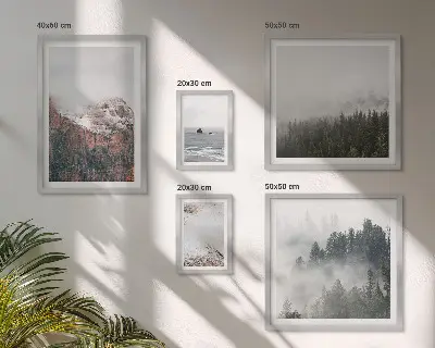 Billedsæt over sofa med motiv af landskaber med bjerge, skove og skyer