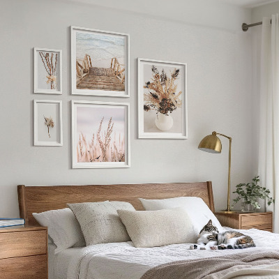 Billedsæt over sofa Stilfulde tørrede planter og vand