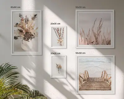 Billedsæt over sofa med motiv af tørrede planter og vand