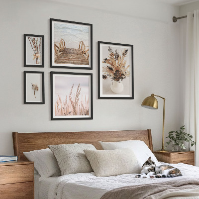 Billedsæt over sofa Stilfulde tørrede planter og vand