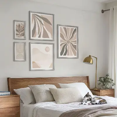 Billedsæt over sofa med stilfulde naturkompositioner